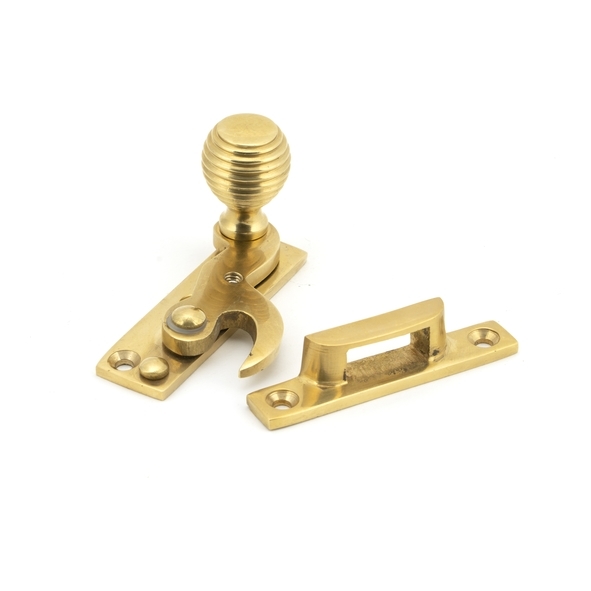 45935  64 x 19mm  Polished Brass  From The Anvil Beehive Sash Hook Fastener