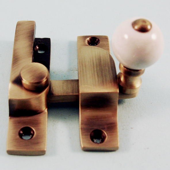 THD104N/AB  Non-Locking  Antique Brass  Narrow Straight Arm Ceramic Knob Sash Fastener