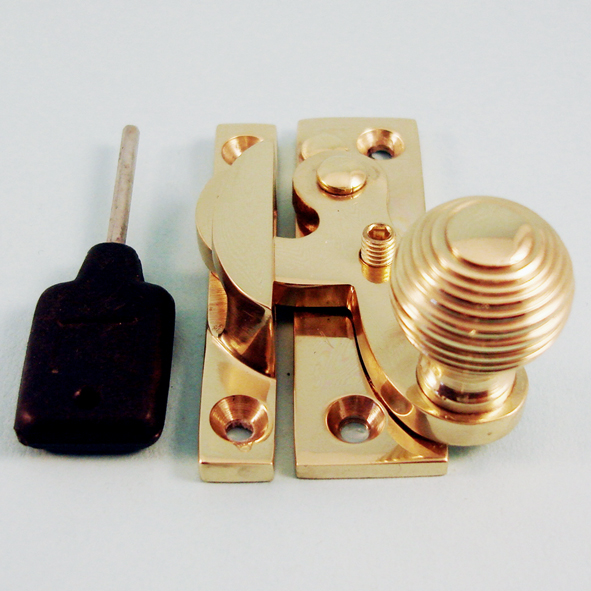 THD113L/PB  Locking  Polished Brass  Locking Clo Reeded Knob Sash Fastener