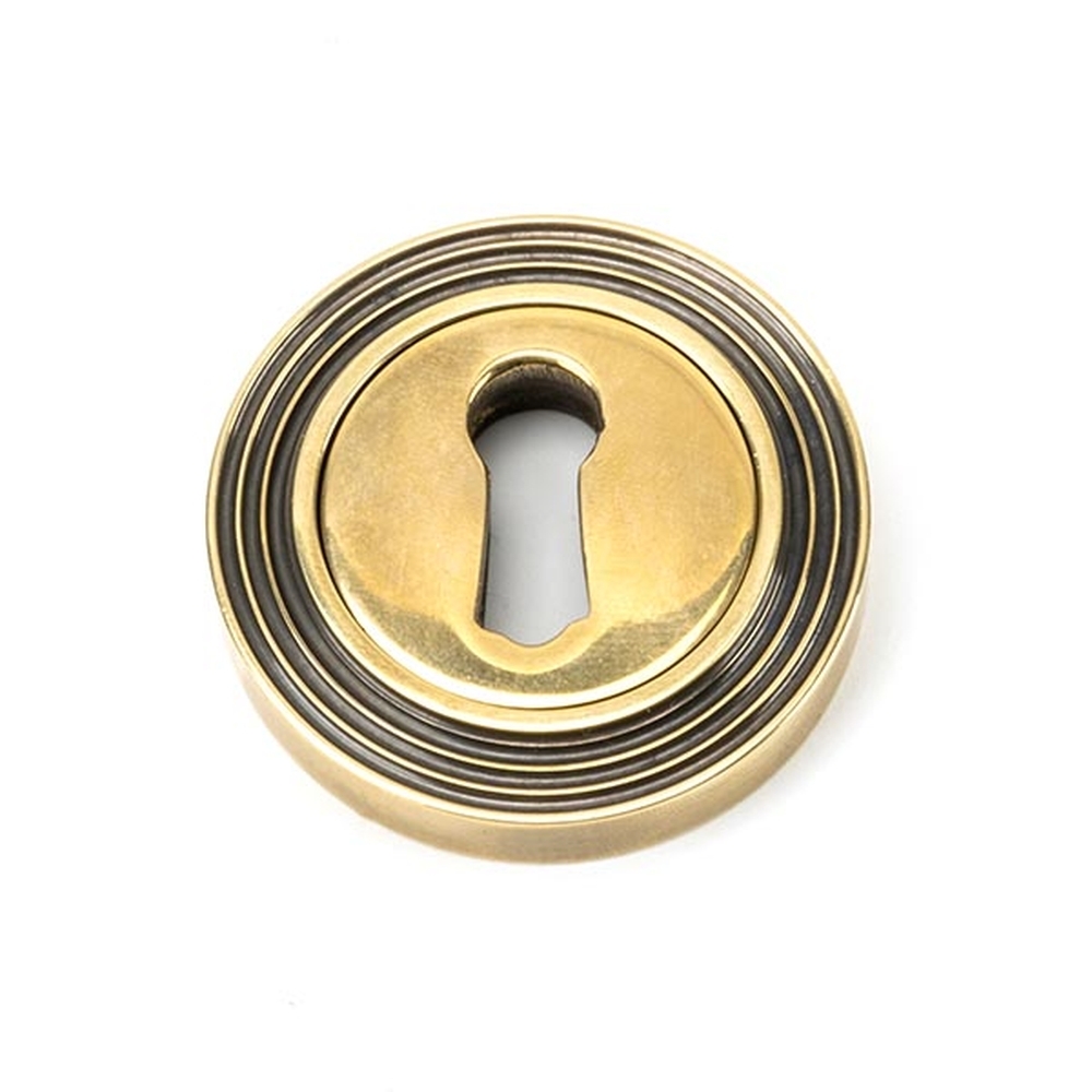 45685 • 53mm • Aged Brass • From The Anvil Round Escutcheon [Beehive]