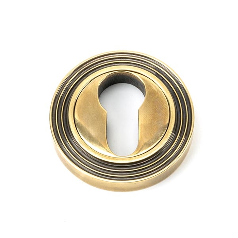 45709 • 53mm • Aged Brass • From The Anvil Round Euro Escutcheon [Beehive]