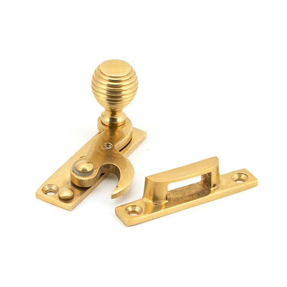 45935 • 64 x 19mm • Polished Brass • From The Anvil Beehive Sash Hook Fastener