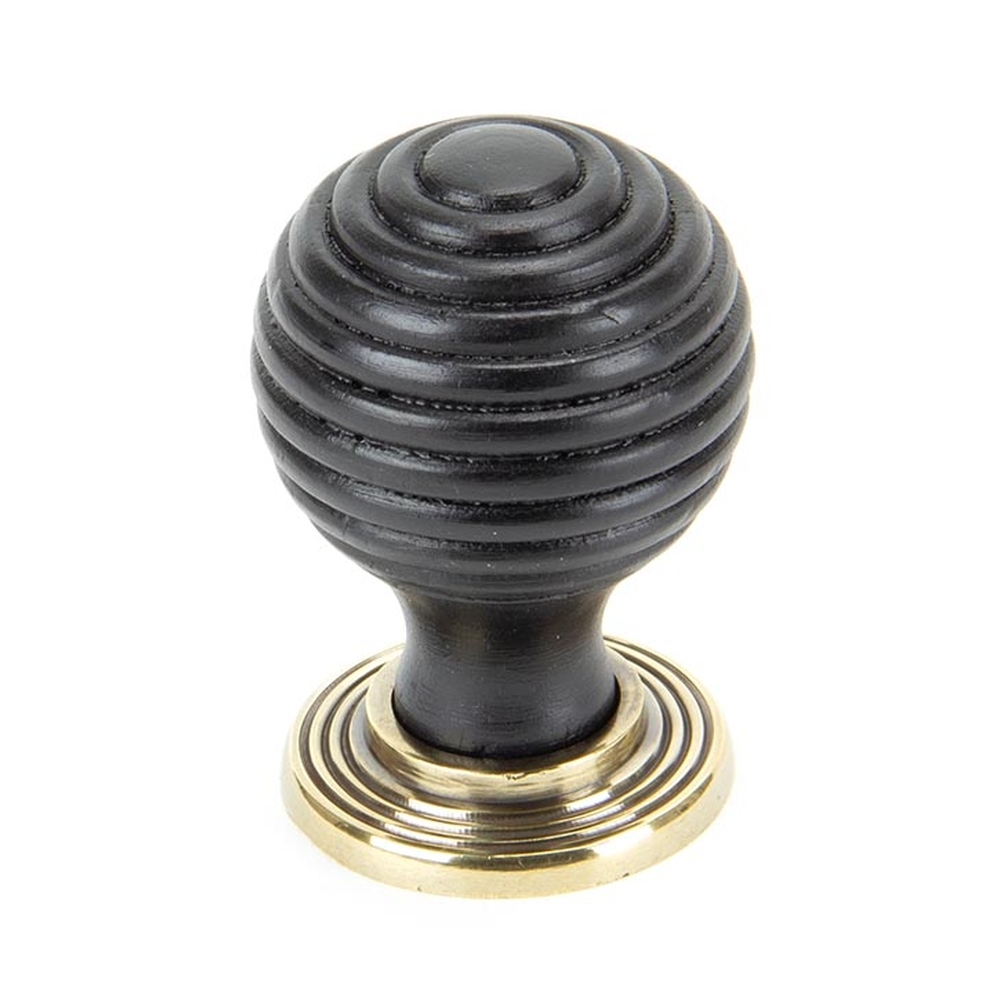 83871 • 35mm • Ebony & Aged Brass • From The Anvil Beehive Cabinet Knob