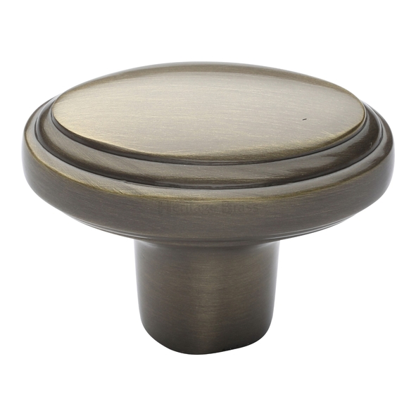 C3975-AT • 40 x 25 x 16 x 30mm • Antique Brass • Heritage Brass Oval Stepped Cabinet Knob