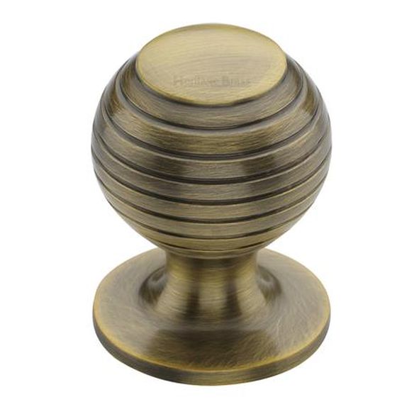 V976 32-AT  32 x 32 x 43mm  Antique Brass  Heritage Brass Beehive On Rose Cabinet Knob
